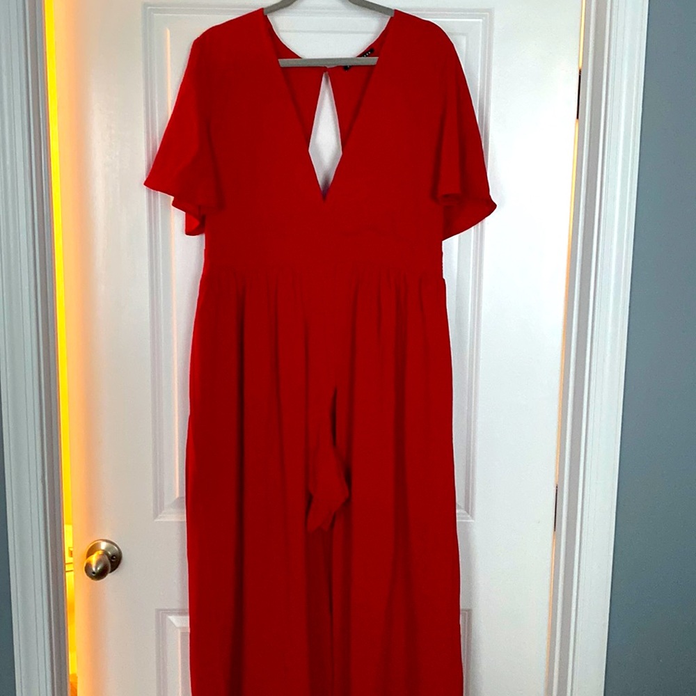 Red romper with hi low skirt